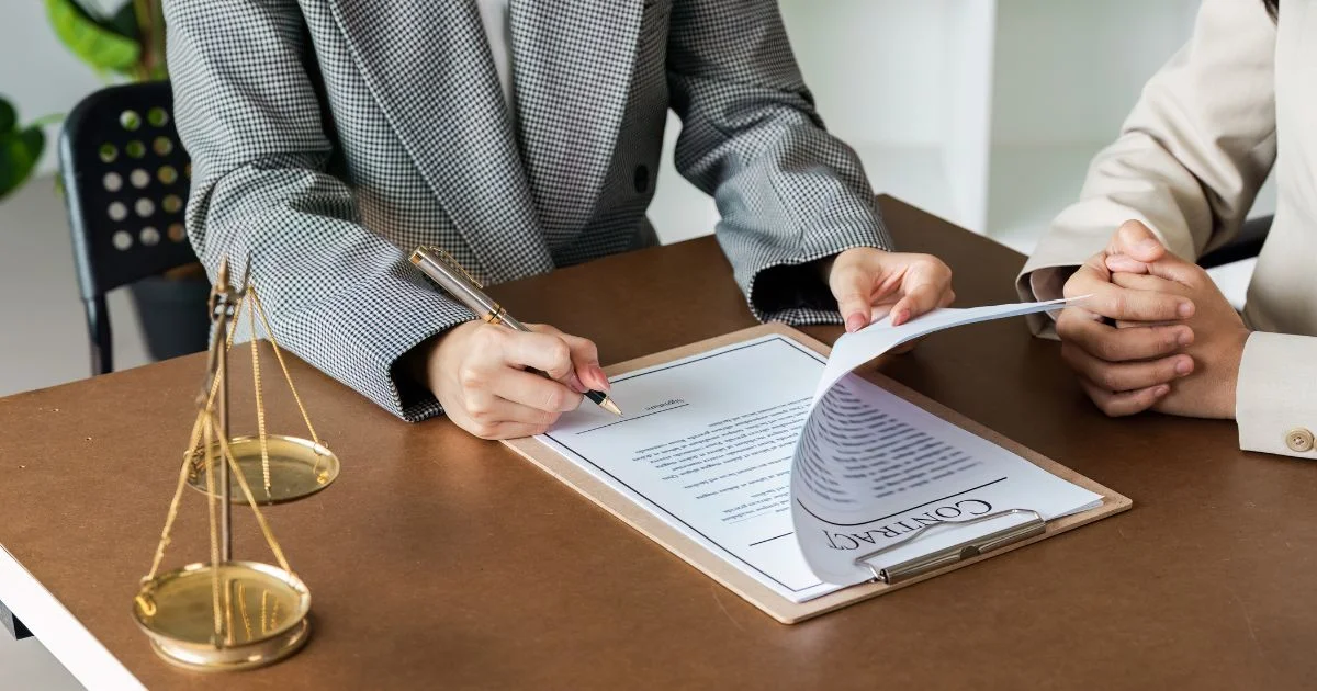 Lawyer reviewing co-parenting agreement with client
