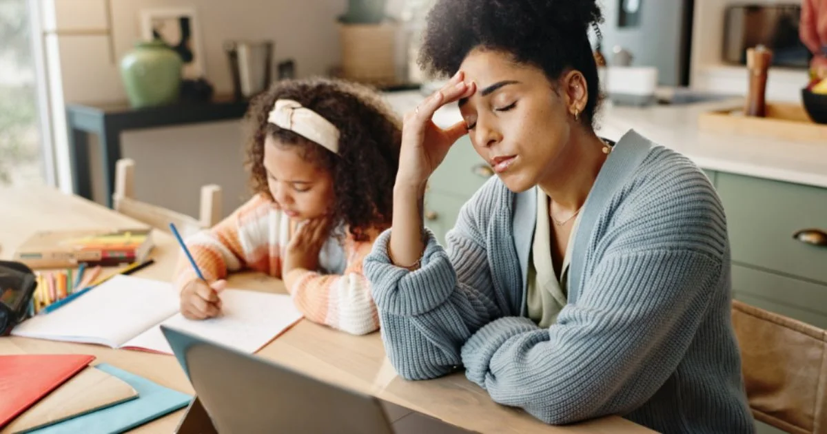 Stressed mother helping child during separation